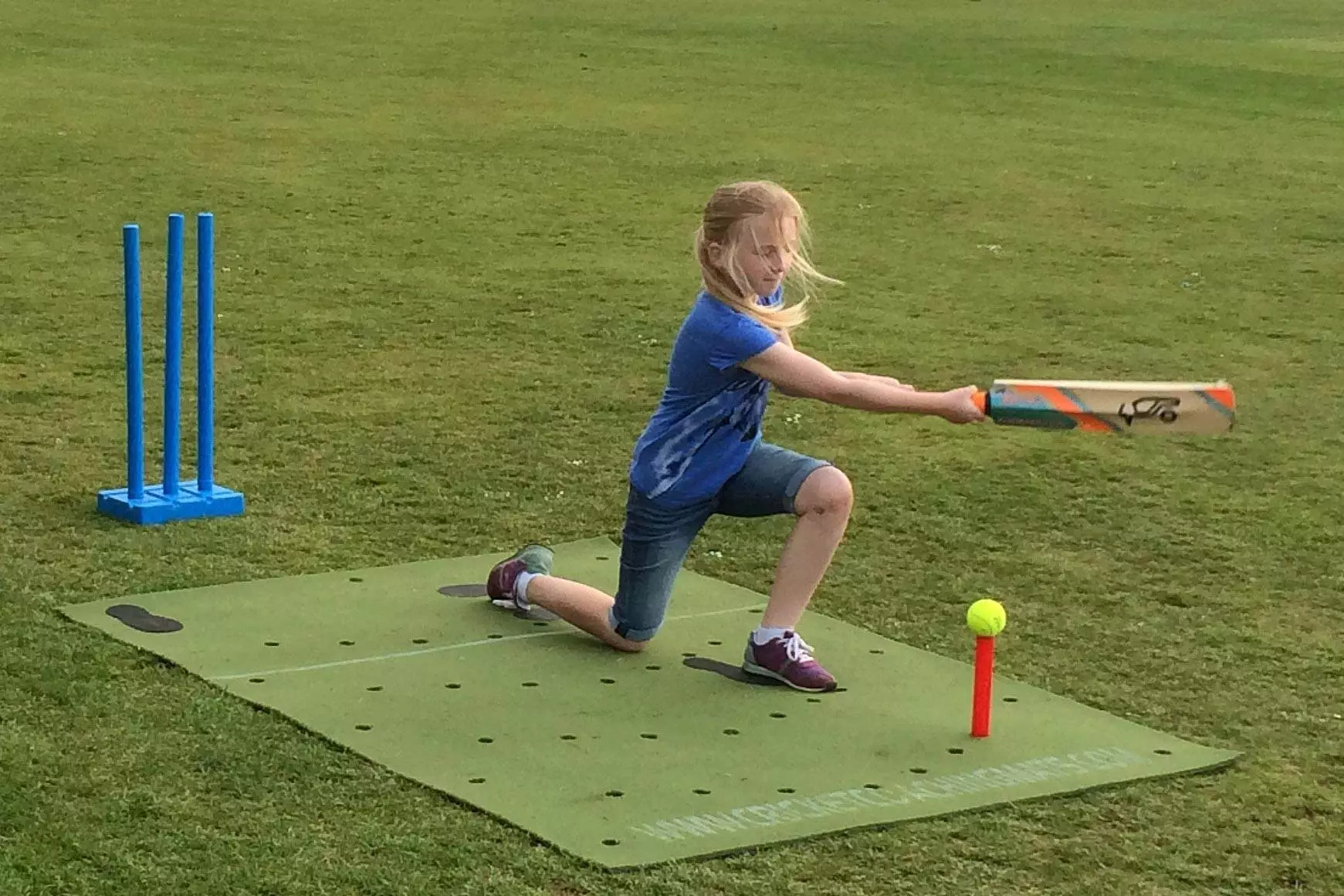 Who uses our cricket coaching mats? 3 Girls cricket coach. Practice cricket in the garden with the cricket training, practice coaching mat
