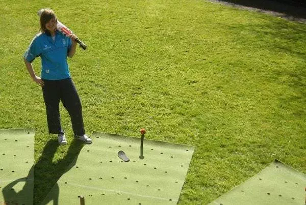 Girls cricket practice with Cricket coaching and batting mat